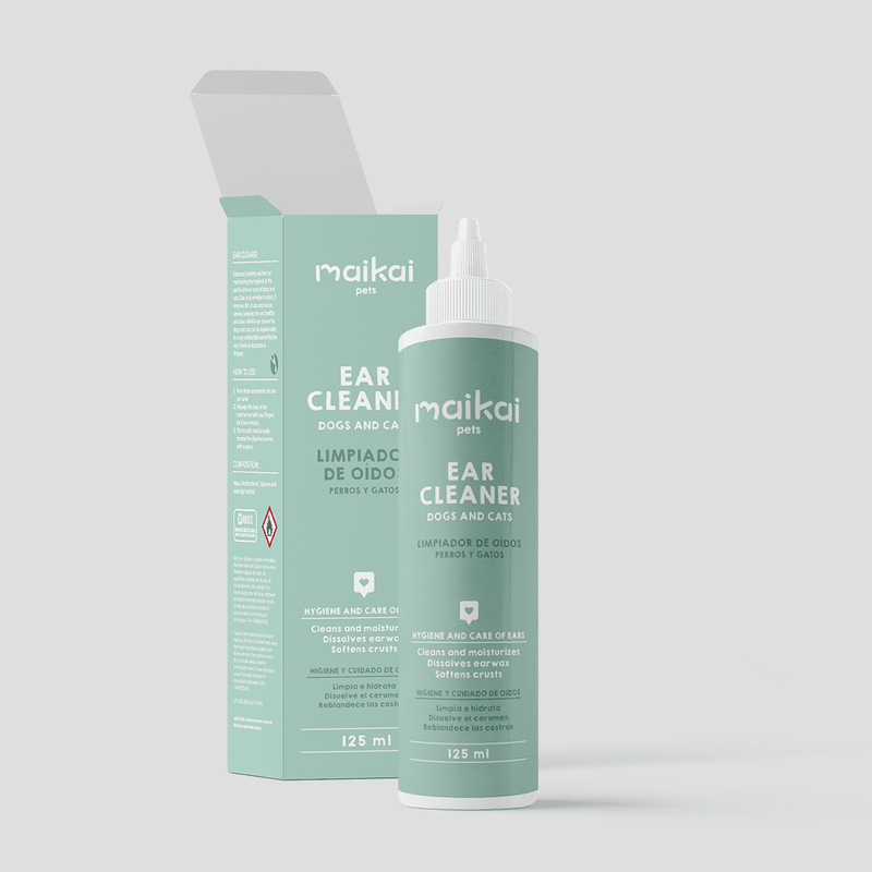 Frasco verde-água de 125ml do limpador de ouvidos Maikai Pets para cães e gatos, com caixa aberta.