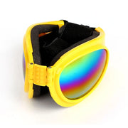 Óculos de sol para cães amarelos, dobráveis, com lentes UV iridescentes e armação de plástico.